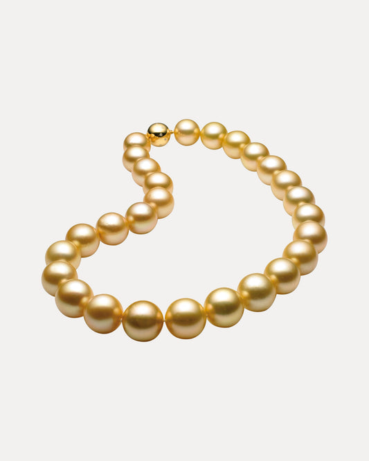 A STRAND OF FINE ROUND GOLD SOUTH SEA PEARLS 14-17MM